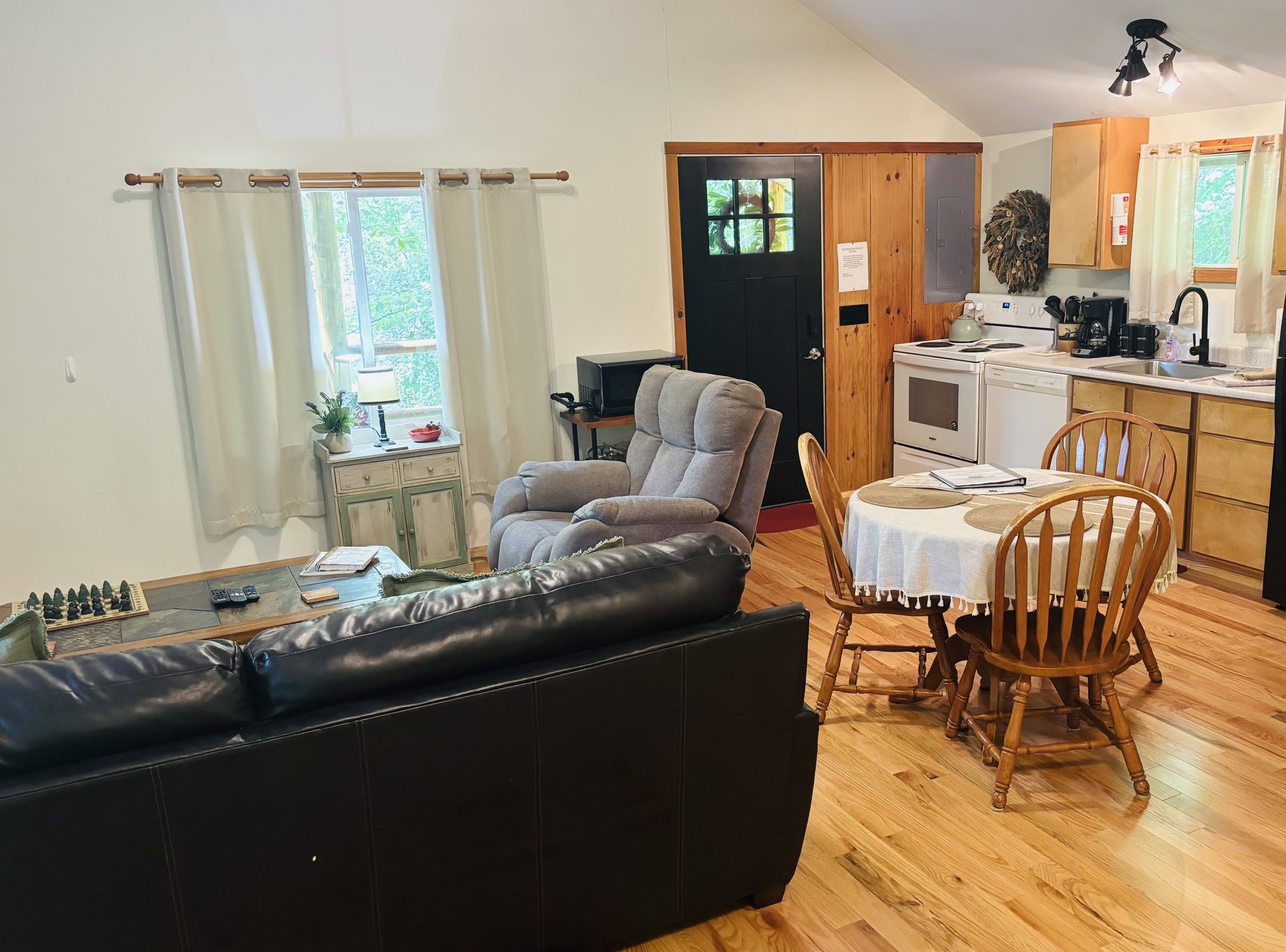 Dining table for four beside the kitchen at Sugar Maple Cabin