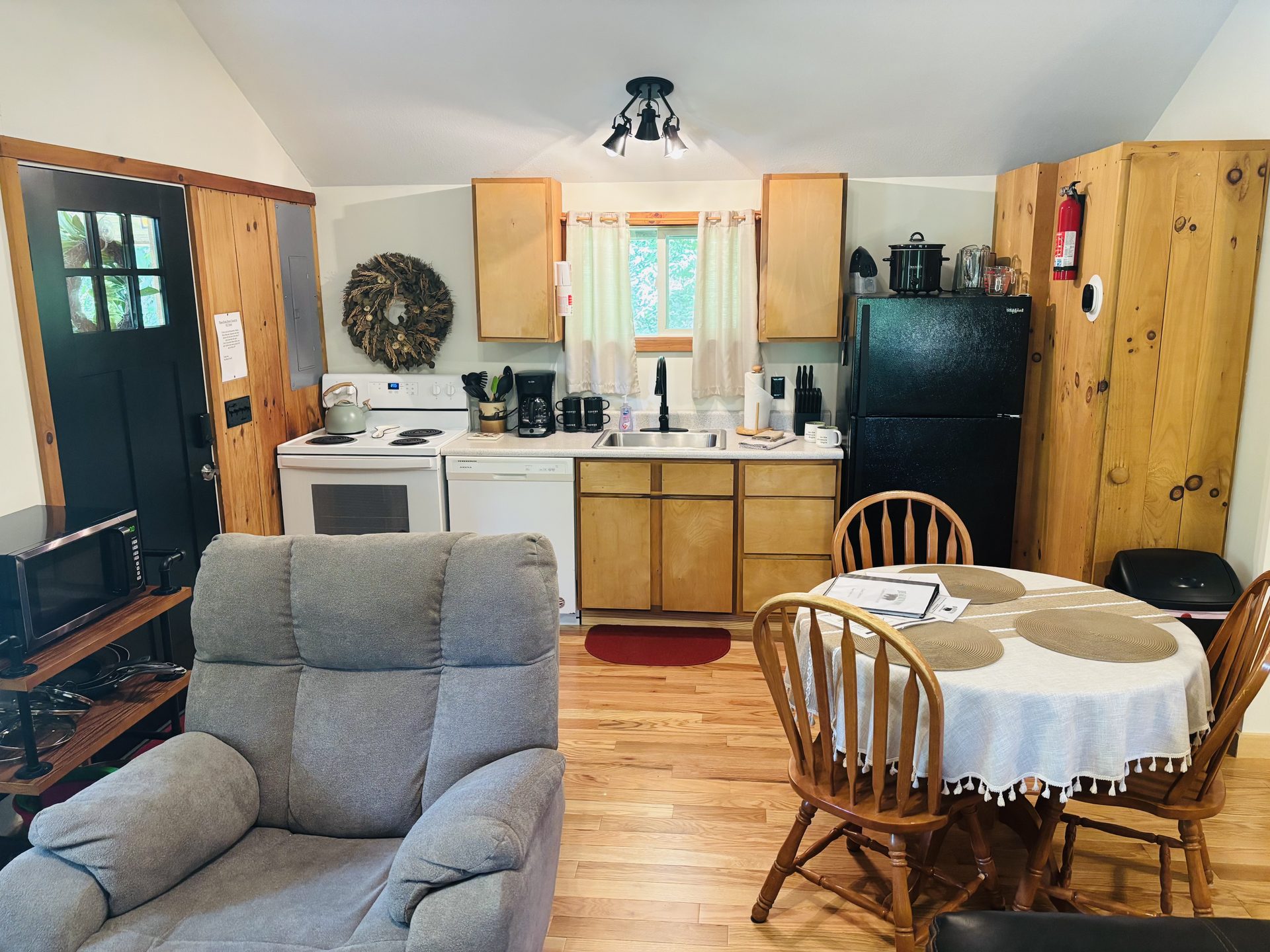 Full kitchen with stove, dishwasher and refrigerator at Sugar Maple Cabin