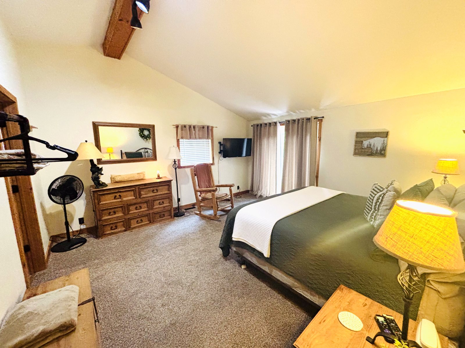 Third bedroom at Red Oak Cabin, a king bed beside the door to the hall